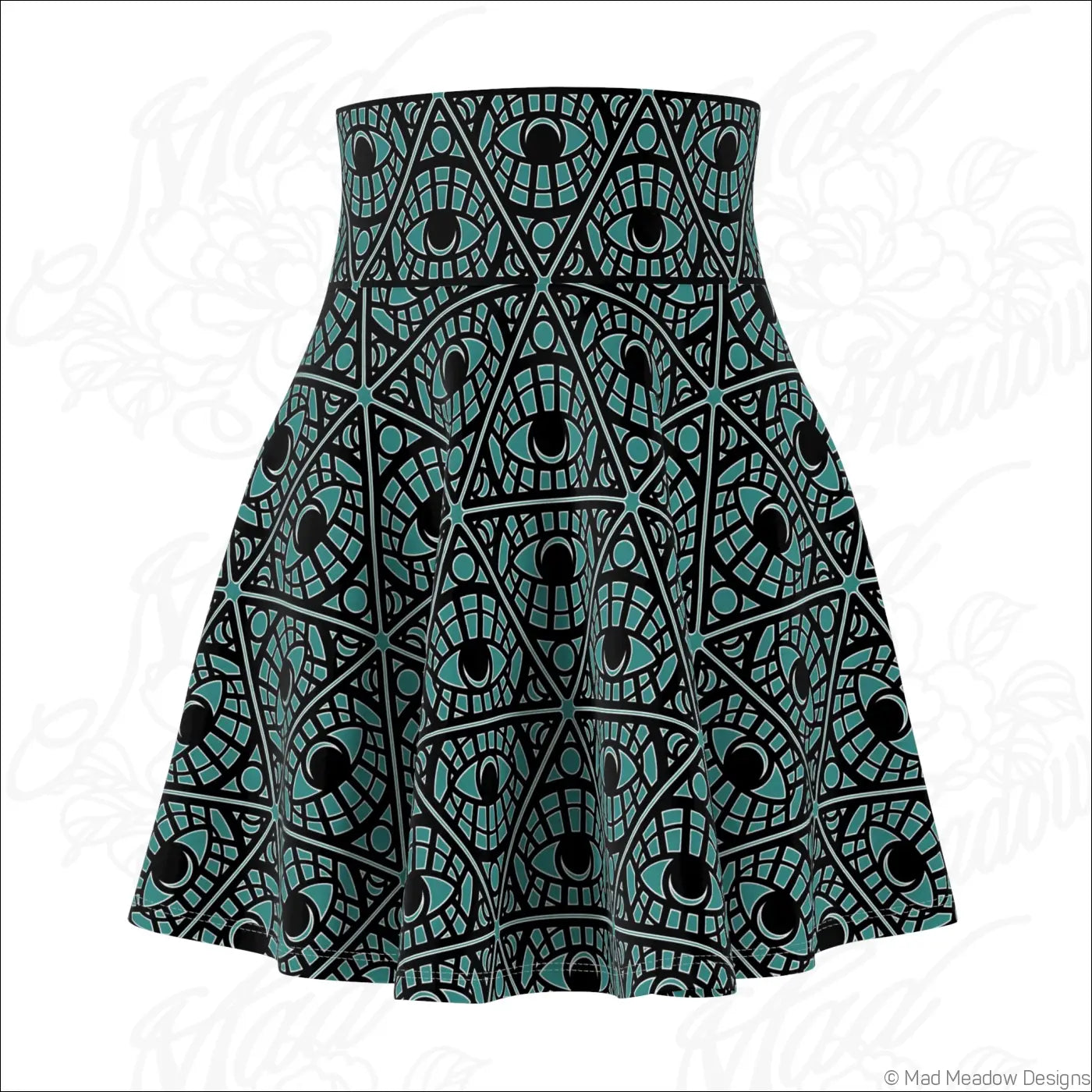 A high waisted skater skirt with stretch fabric featuring a teal mystic eye tribal printed pattern and printed care label