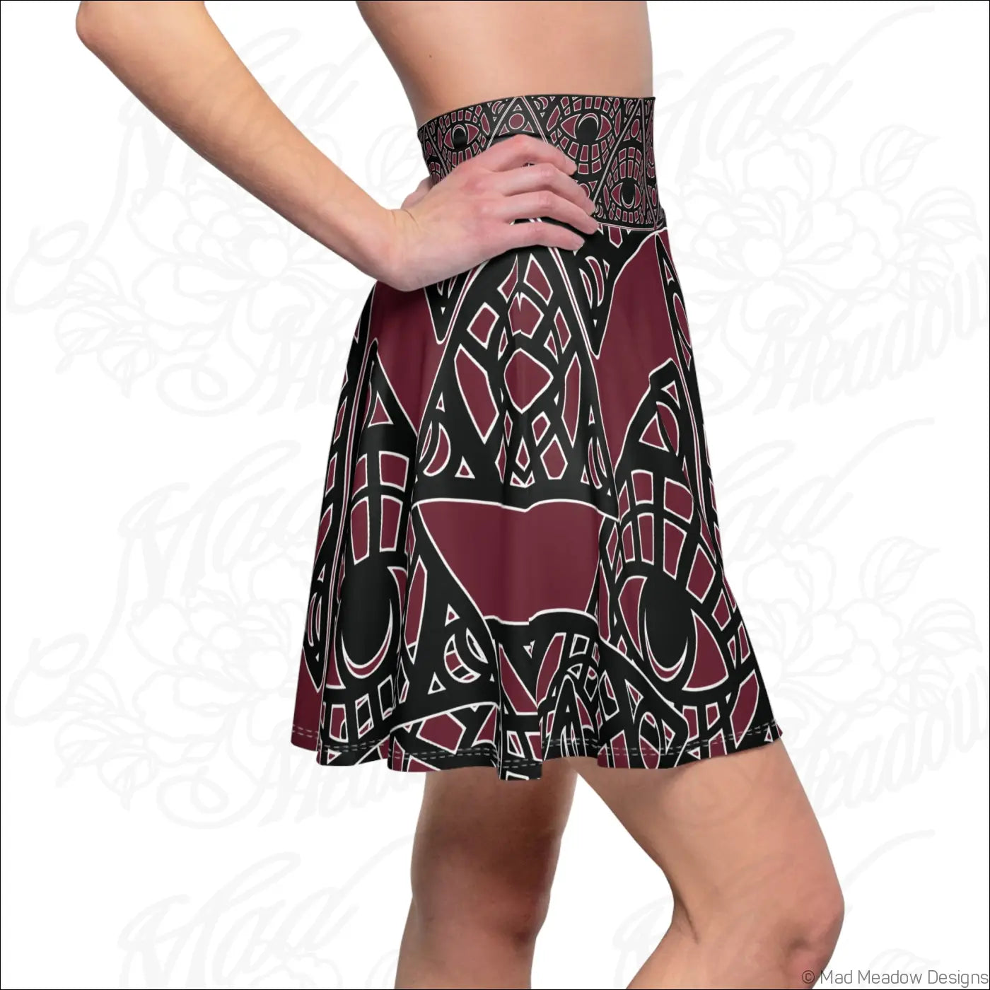 Mystic eye tribal skater skirt in bordeaux allover print features a high-waisted flare with stretch fabric and printed care label