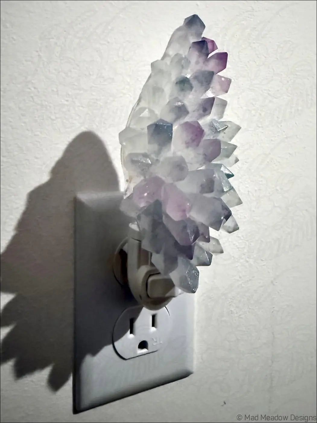 Pastel translucent white and purple crystal cluster resin wall night light with natural faceted design for feather wall night decor