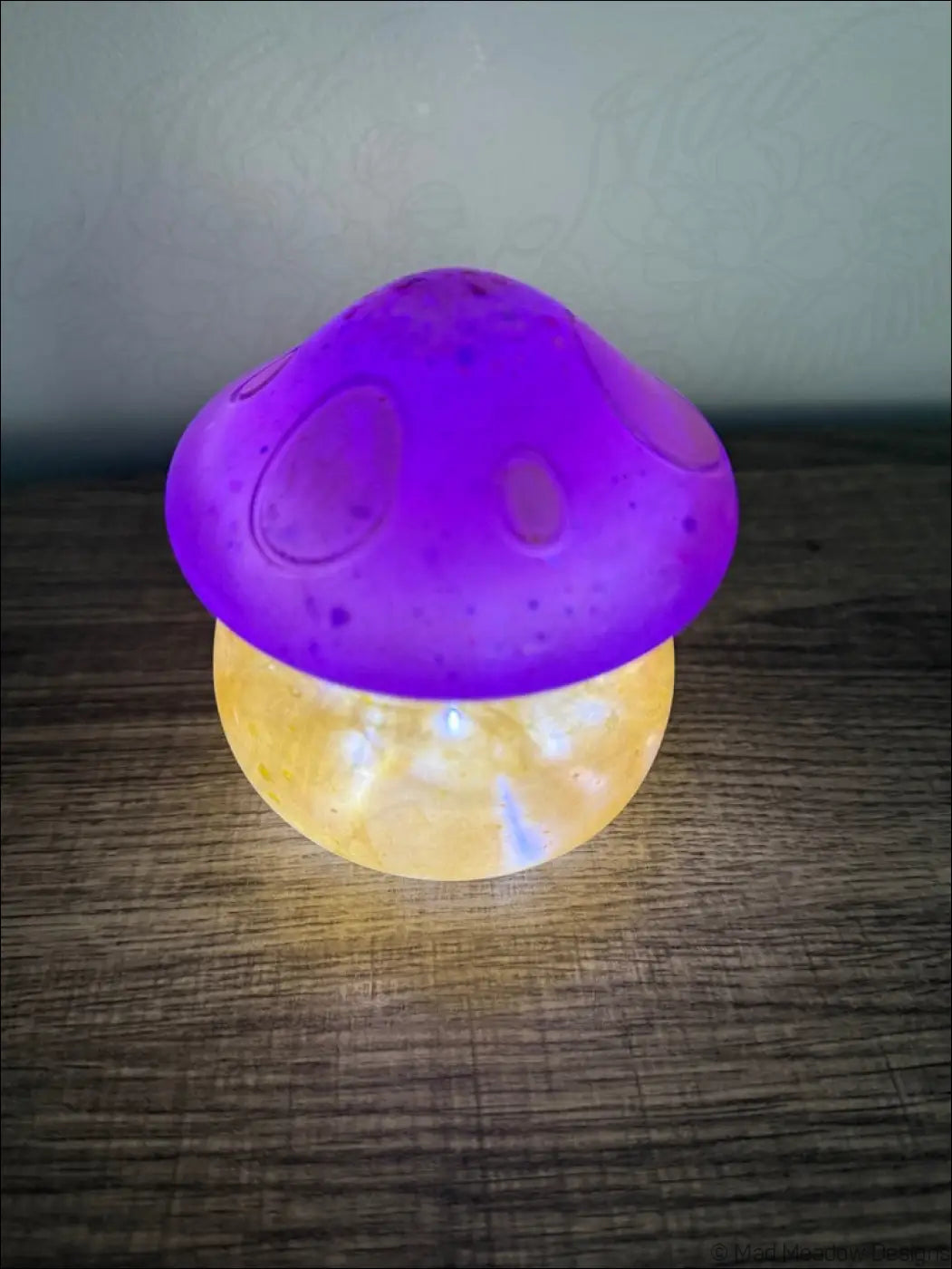Purple and gold chubby mushroom usb light with a translucent speckled cap and glowing led night light base