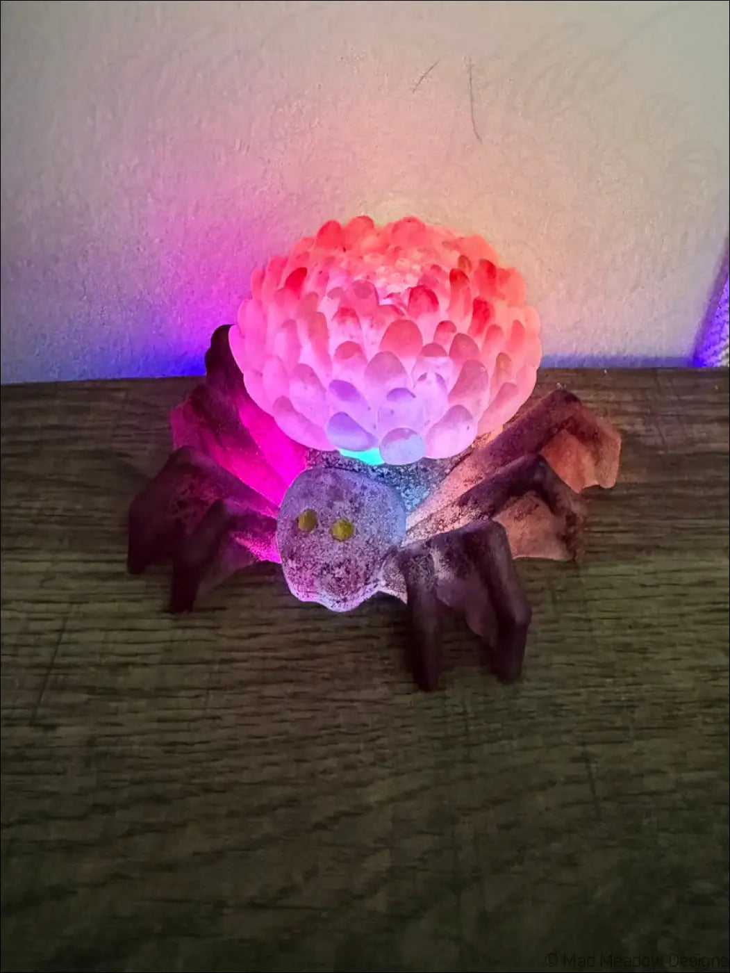 Glowing pink and purple spider-shaped led lamp with textured bubble body and dark brown legs usb app controlled