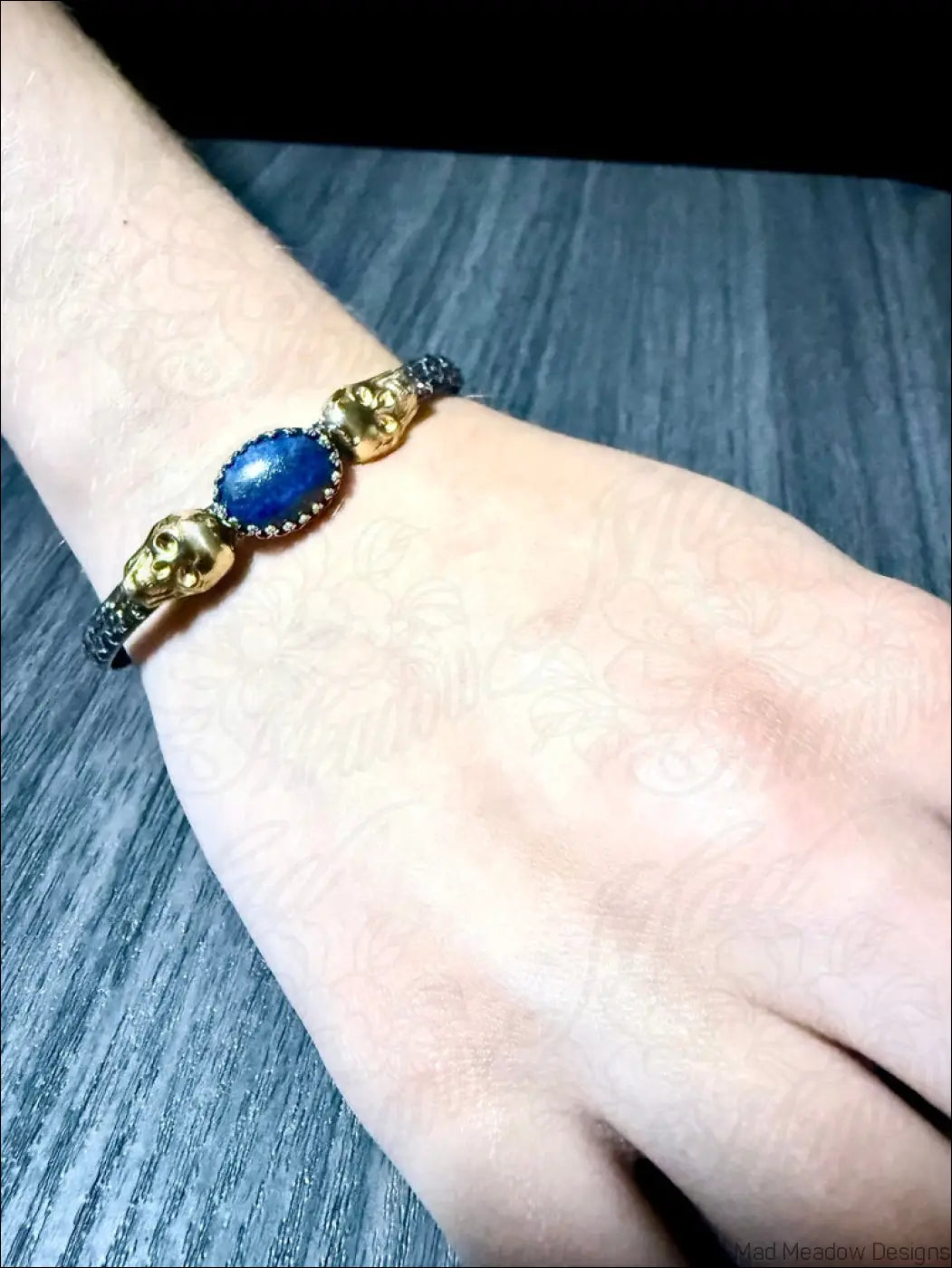 Sterling Silver Cuff Bracelet with Brass Skulls and Lapis Lazuli Stone - Bracelet
