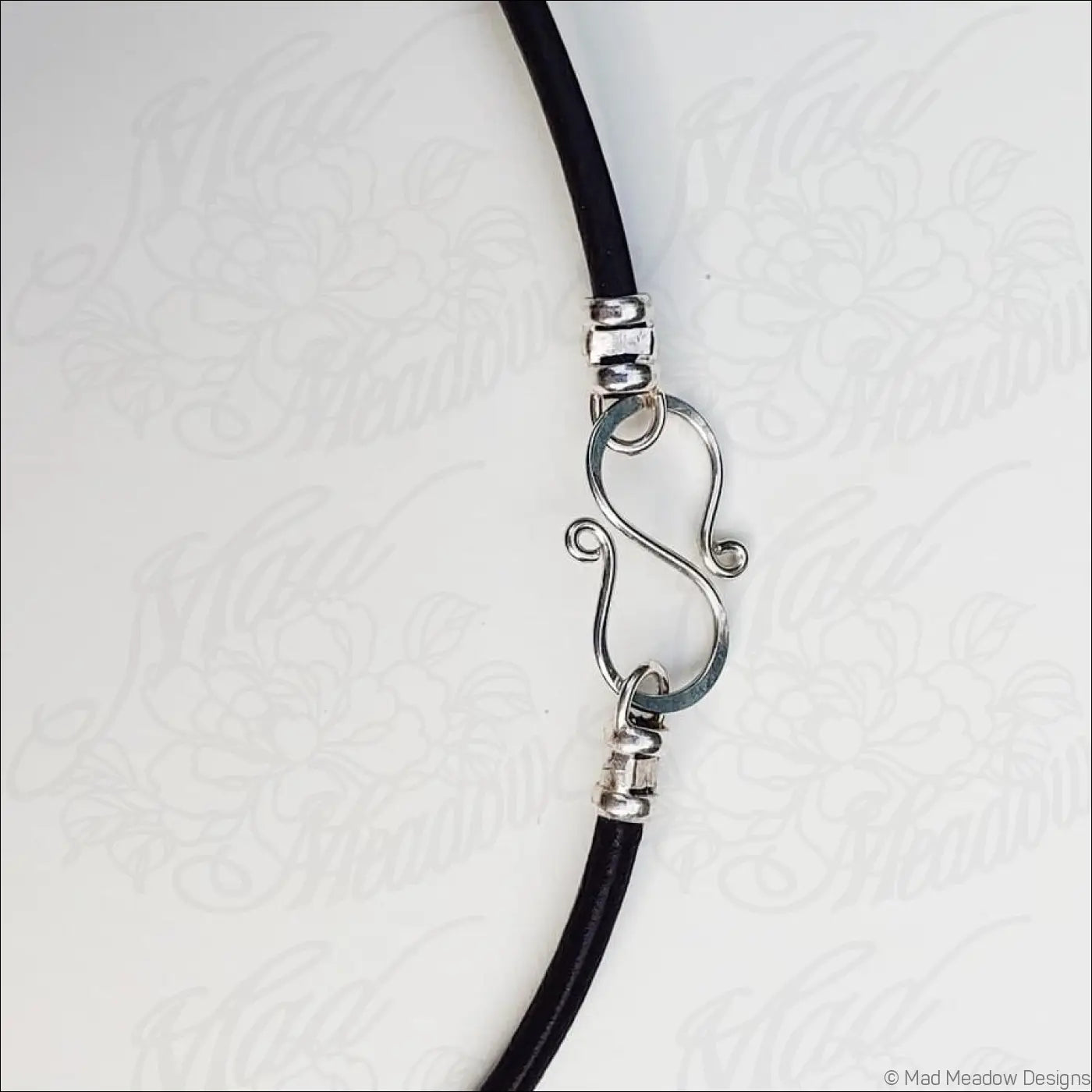 Sterling Silver Fiddlehead Swirl Necklace with Green Peridot Gemstones