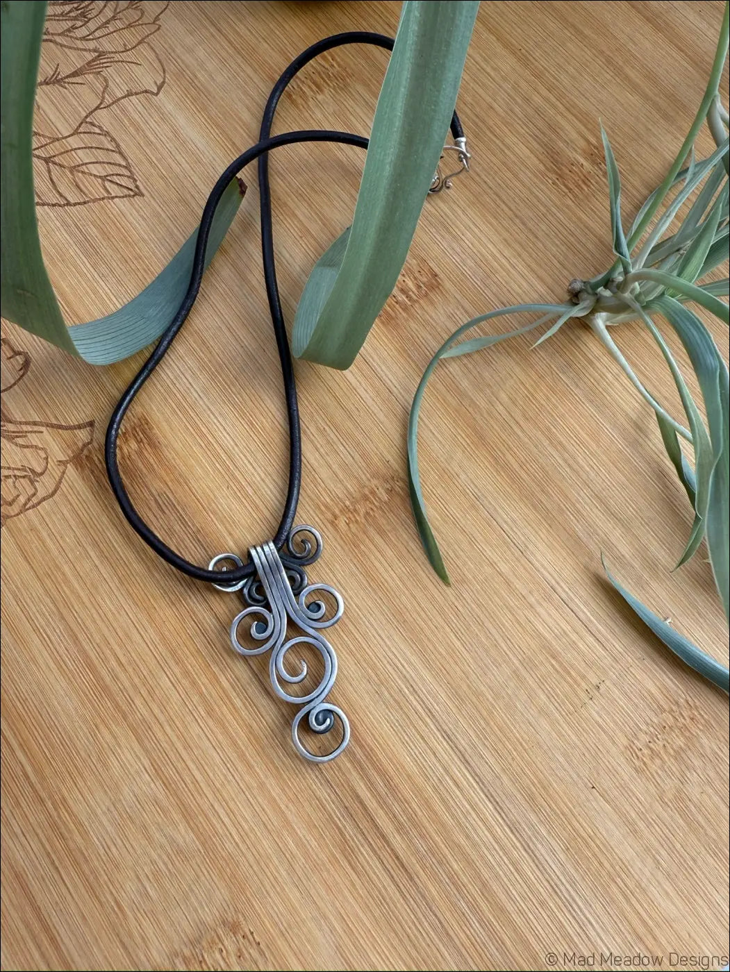 Sterling Silver Fiddlehead Swirl Necklace with Green Peridot Gemstones