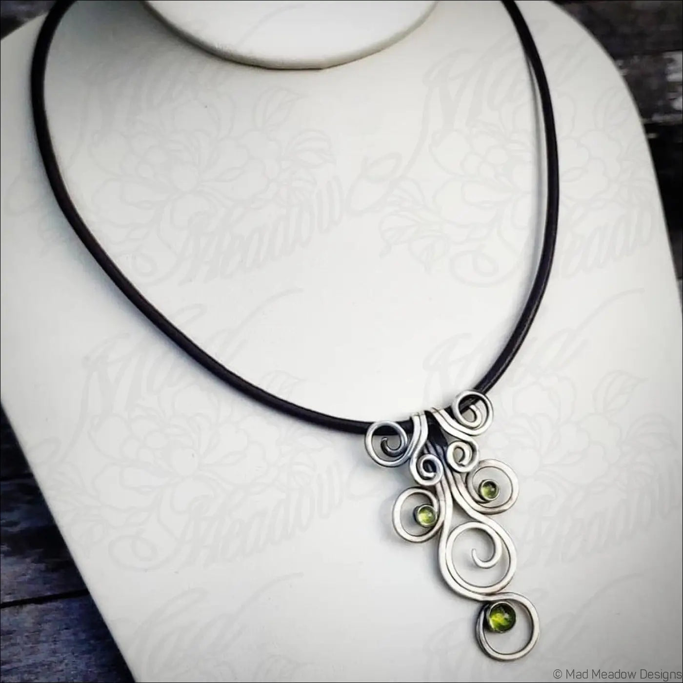 Sterling Silver Fiddlehead Swirl Necklace with Green Peridot Gemstones