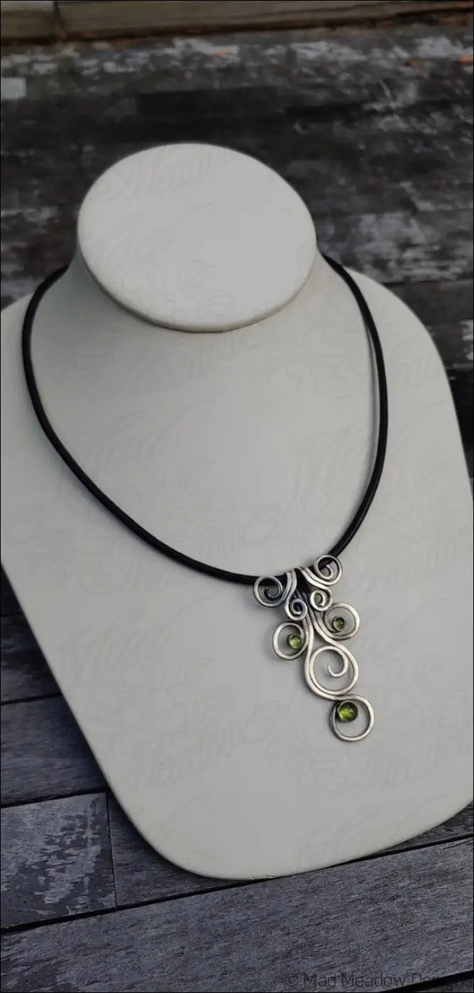 Sterling Silver Fiddlehead Swirl Necklace with Green Peridot Gemstones