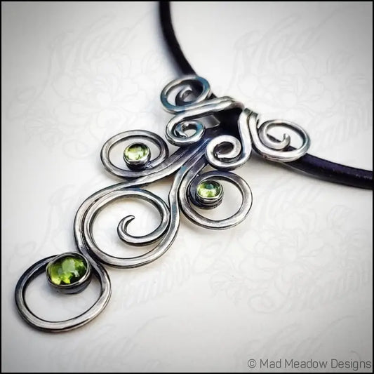 Fiddlehead Sterling Silver and Peridot Artisan Made Pendant on Leather - Jewelry