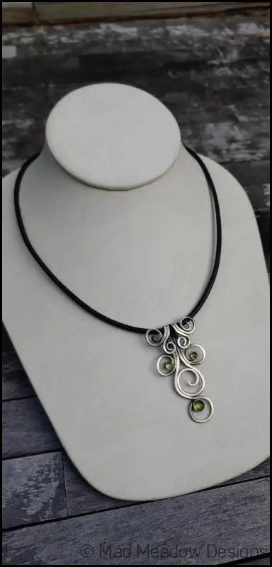 Fiddlehead Sterling Silver and Peridot Artisan Made Pendant on Leather - Jewelry