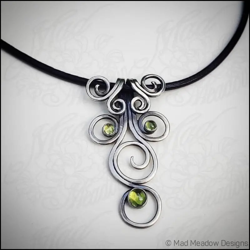 Fiddlehead Sterling Silver and Peridot Artisan Made Pendant on Leather - Jewelry