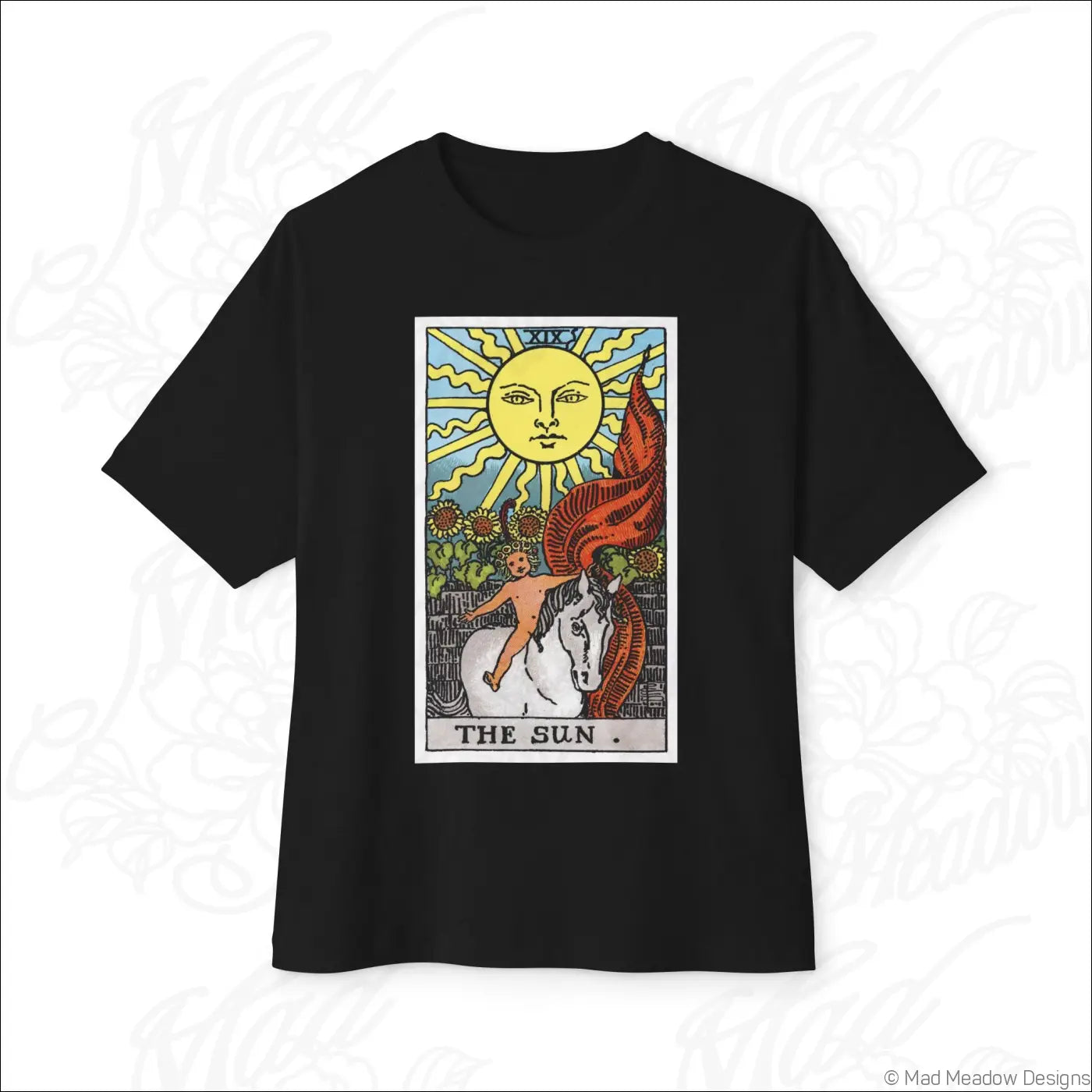 Black oversized boxy short-sleeved t-shirt featuring colorful rider waite smith sun tarot card graphic, low heat care