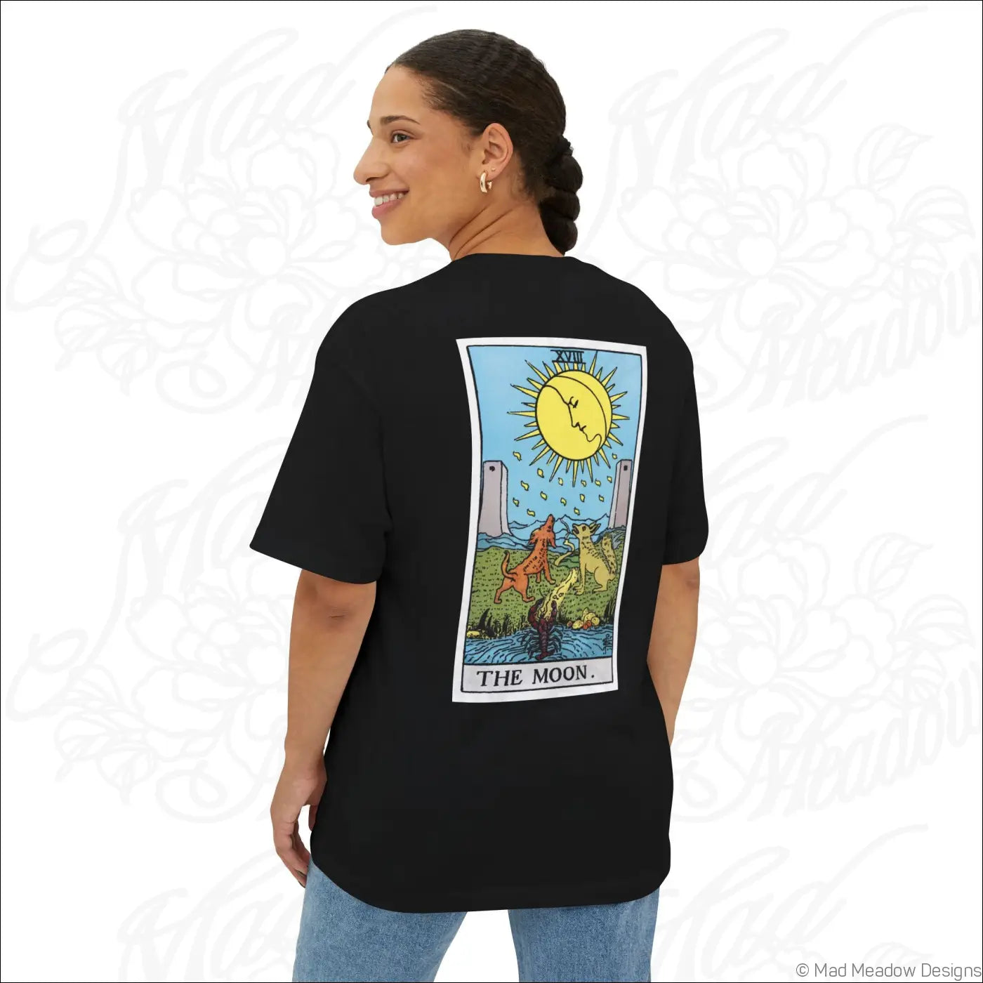 Black oversized boxy t shirt with colorful rider waite smith moon tarot card graphic on the back, low heat care
