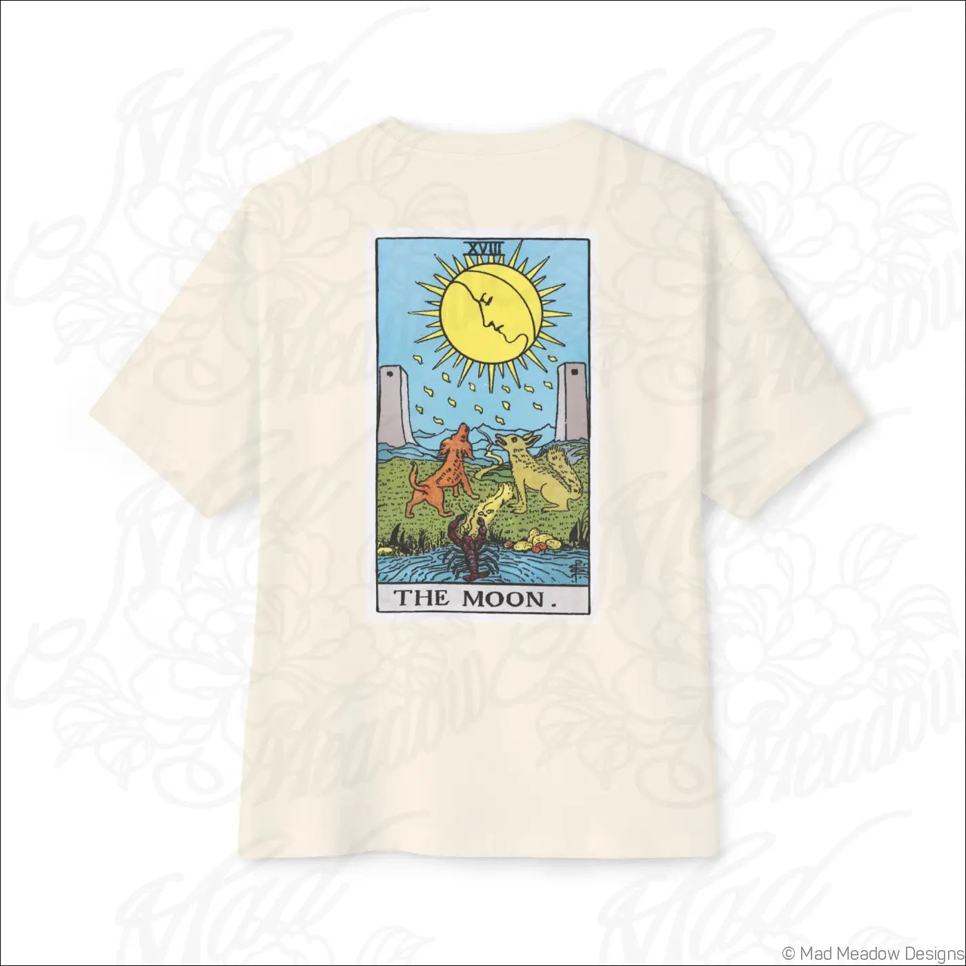 Cream-colored cotton oversized boxy tee with rider waite smith sun and moon tarot card graphic, low heat care recommended