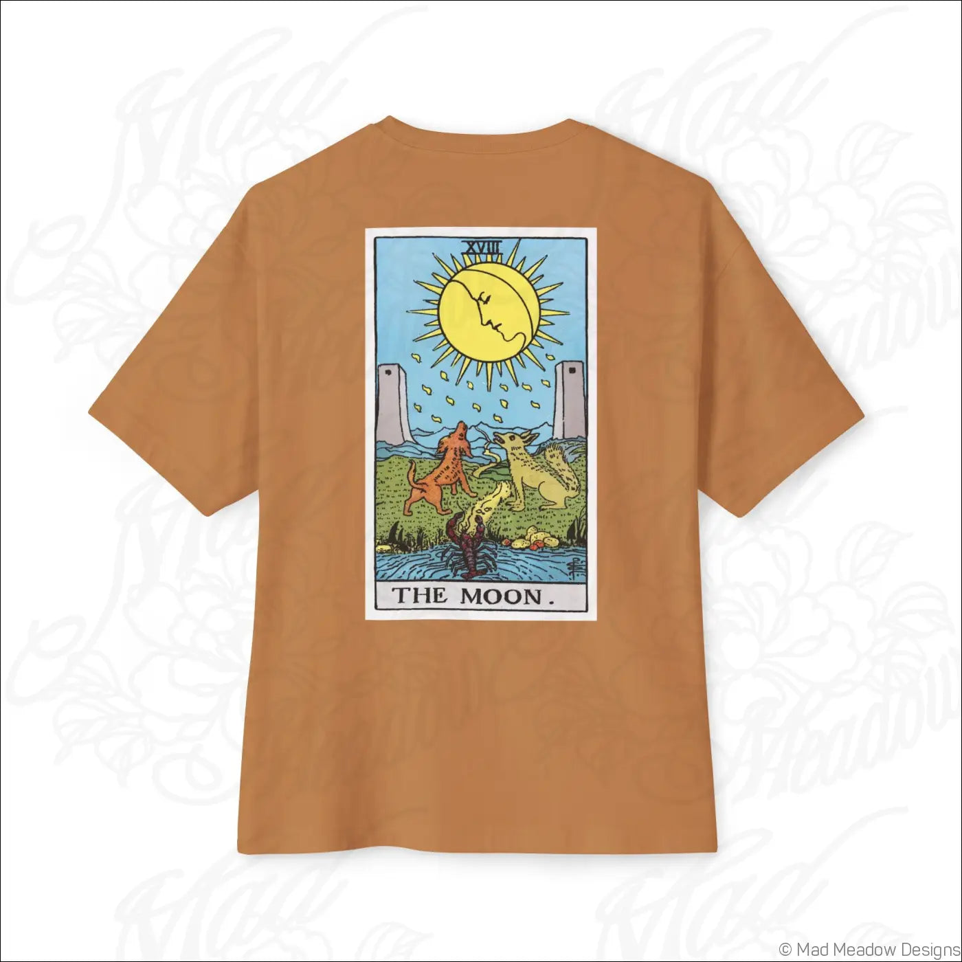 Tan short-sleeved oversized boxy t-shirt with colorful rider waite smith moon tarot card design, low heat care