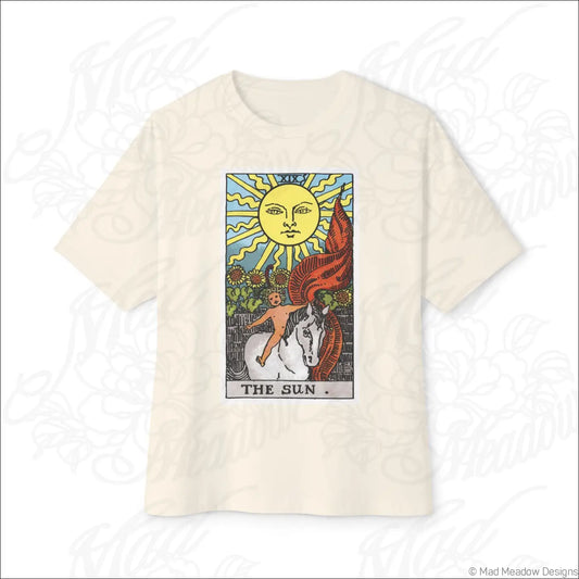 Cream-colored oversized boxy tee with the sun tarot rider waite smith design featuring a smiling sun on low heat care