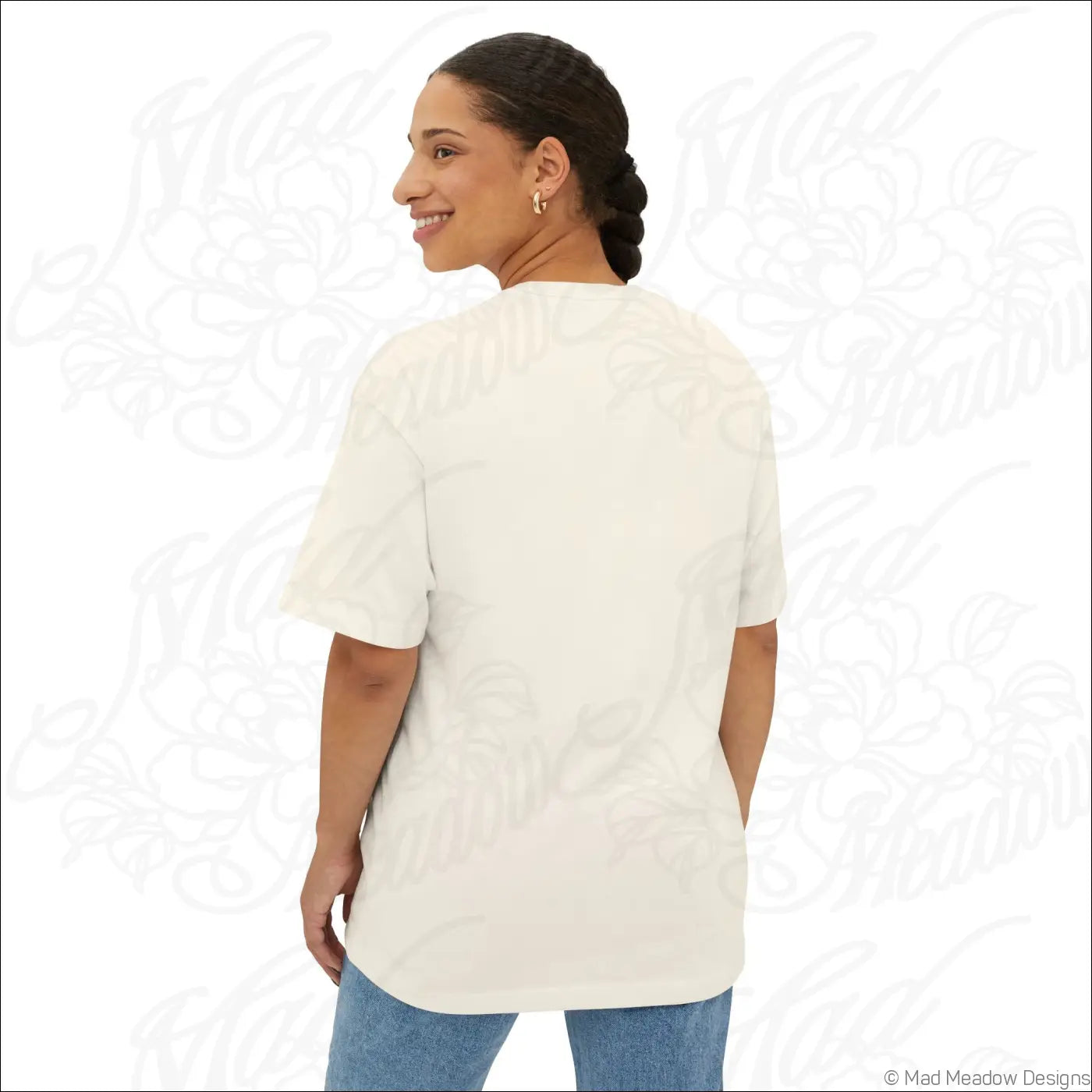 A soft off-white cotton oversized boxy tee with relaxed fit and short sleeves perfect for low heat wear