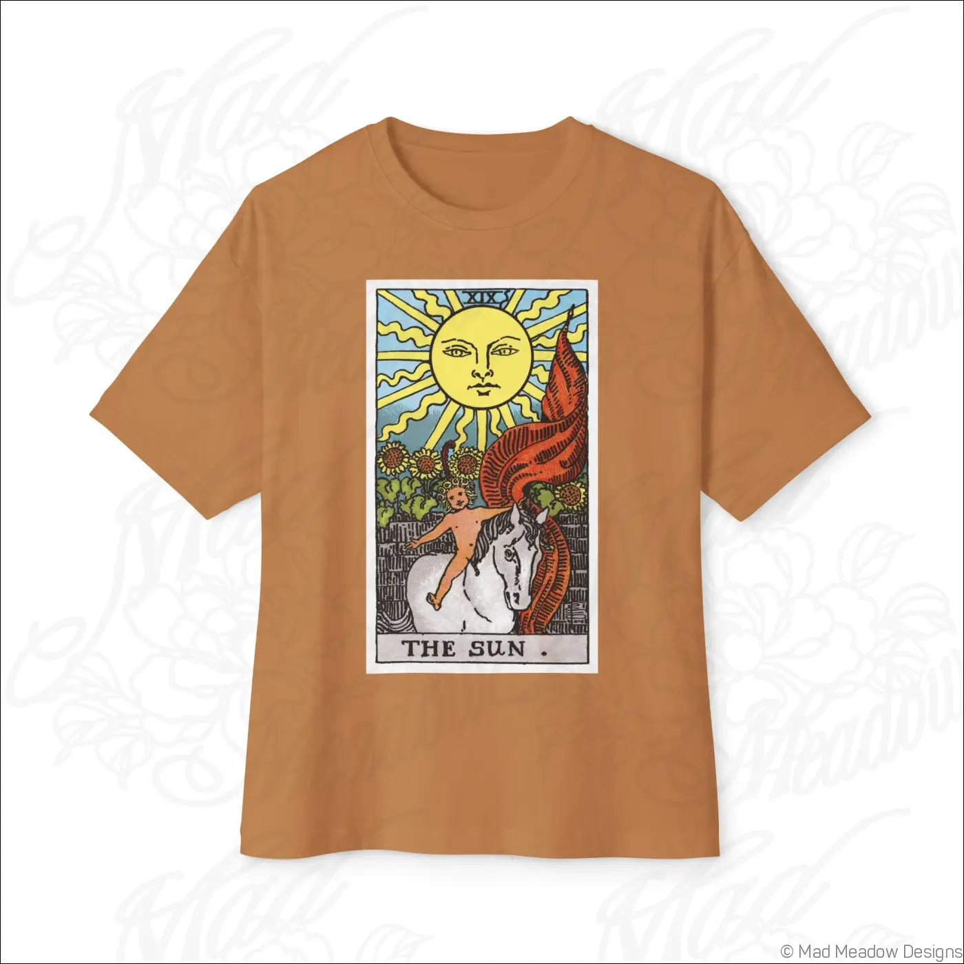 Tan oversized boxy tee featuring a colorful sun tarot card with a smiling sun, white horse, and red wings, low heat care