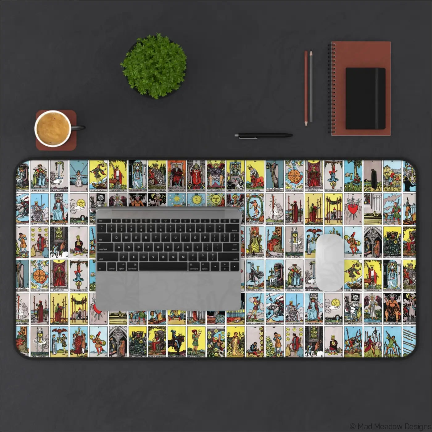 Rectangular desk mat with a vibrant vintage lotería-style tarot card grid design made for easy cleaning with warm water