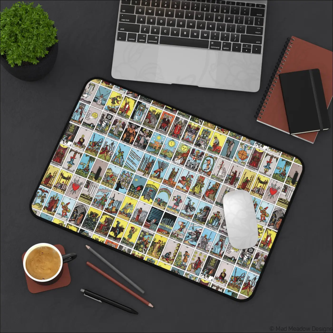 Rectangular desk mat with vibrant colorful vintage lotería style tarot card grid illustration and care instructions for warm water cleaning