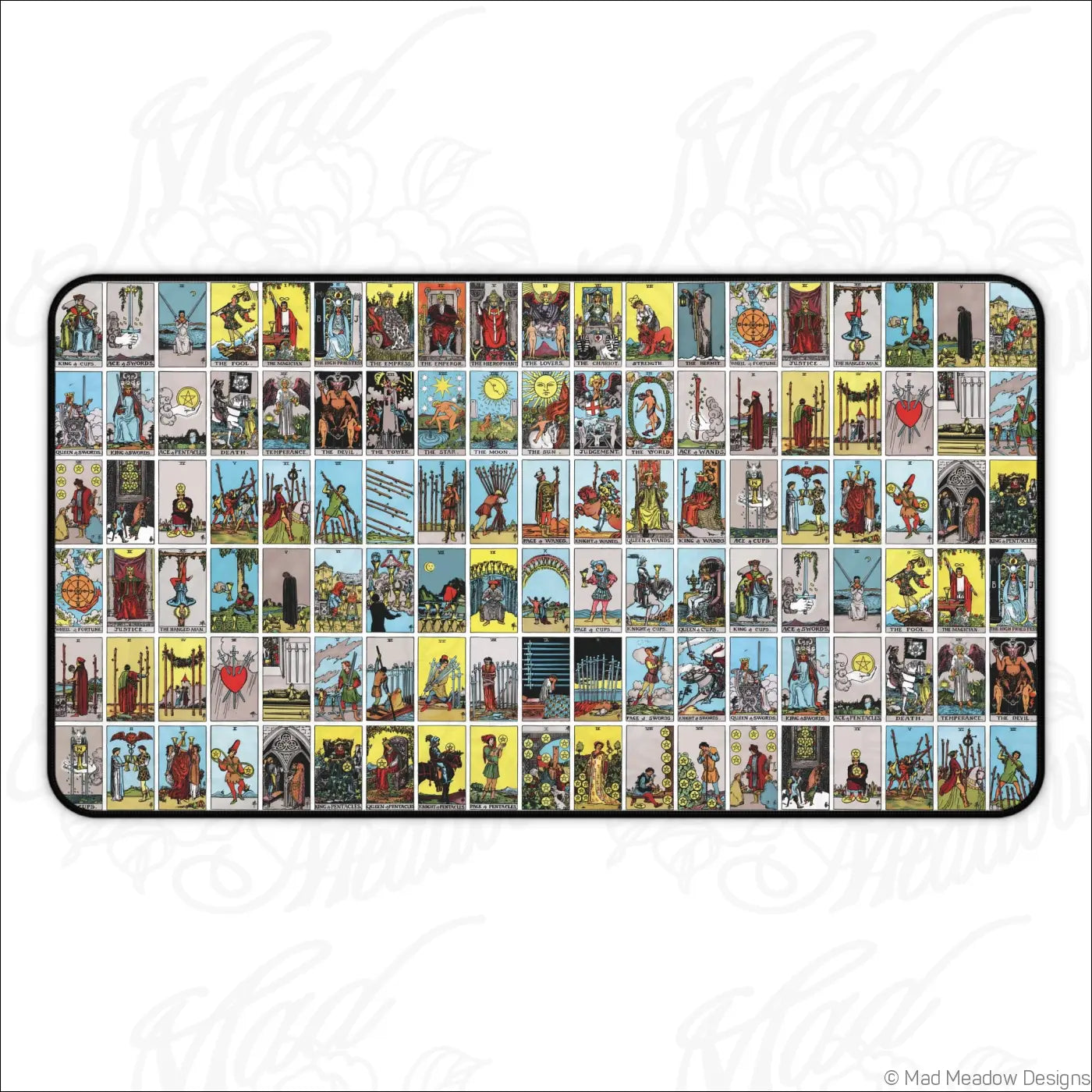 Rectangular desk mat featuring vibrant vintage lotería-style tarot card grid with care instructions for cleaning in warm water