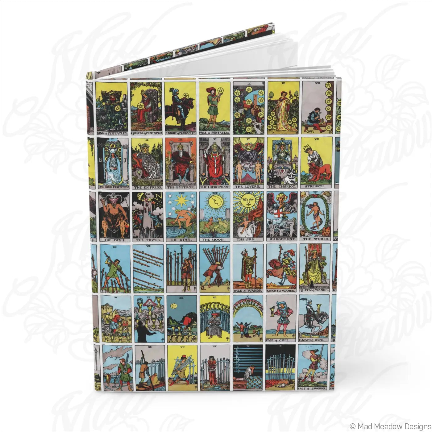 A hardcover journal with lined pages and matte finish featuring vibrant vintage rider-waite tarot card illustrations