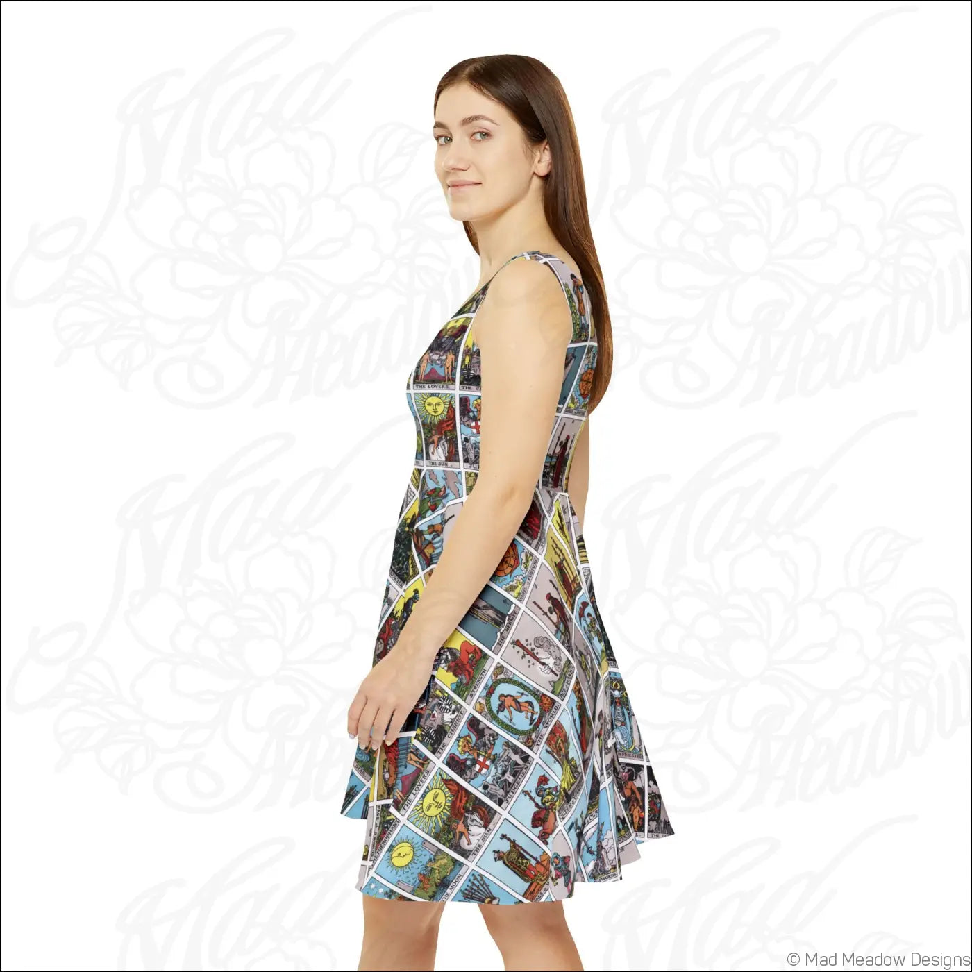 A sleeveless skater dress with a high-cut scoop neckline featuring a vibrant vintage arcana tarot card print