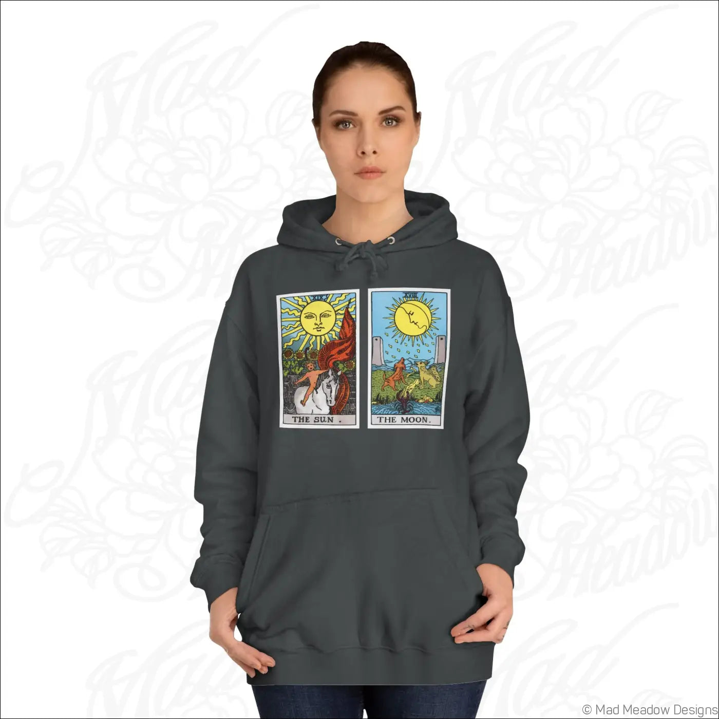 Dark gray hooded sweatshirt with vibrant tarot card sun and moon design featuring care instructions for low heat