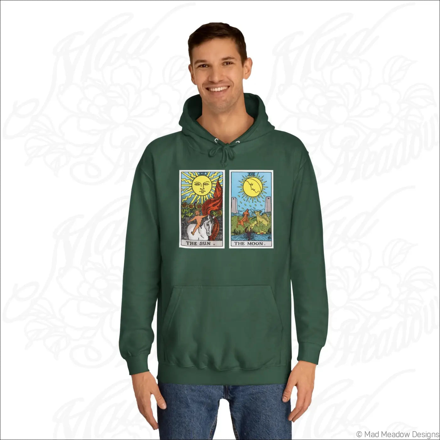 Dark green hooded sweatshirt with vibrant sun and moon tarot card graphic print and low heat care instructions