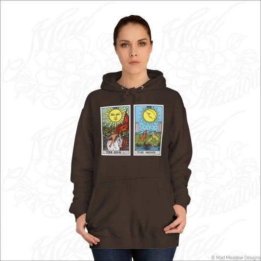 Dark brown hooded sweatshirt with vibrant tarot card graphic of the sun and the moon and low heat care instructions