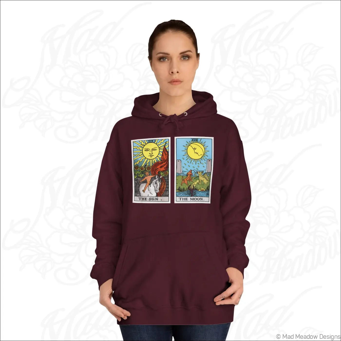 Maroon hooded sweatshirt with tarot card sun and moon graphic print featuring low heat care instructions