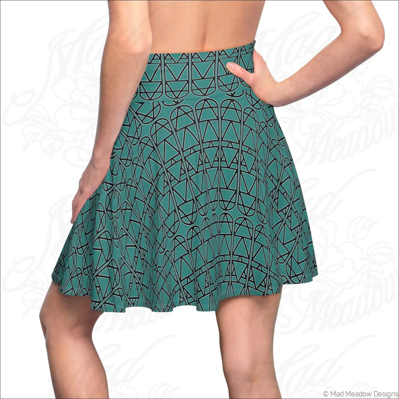 Teal elemental column pattern women’s skater skirt with bold black geometric design and care instructions to hand wash
