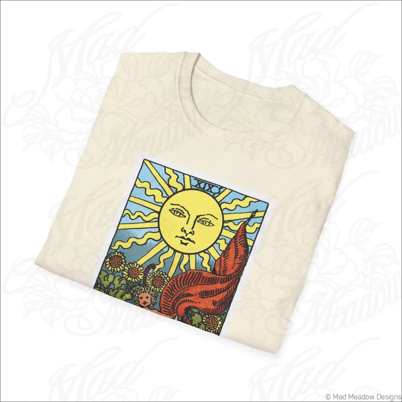Cream-colored ethically sourced cotton t-shirt with vibrant sun tarot card design and vintage tarot style for low heat care